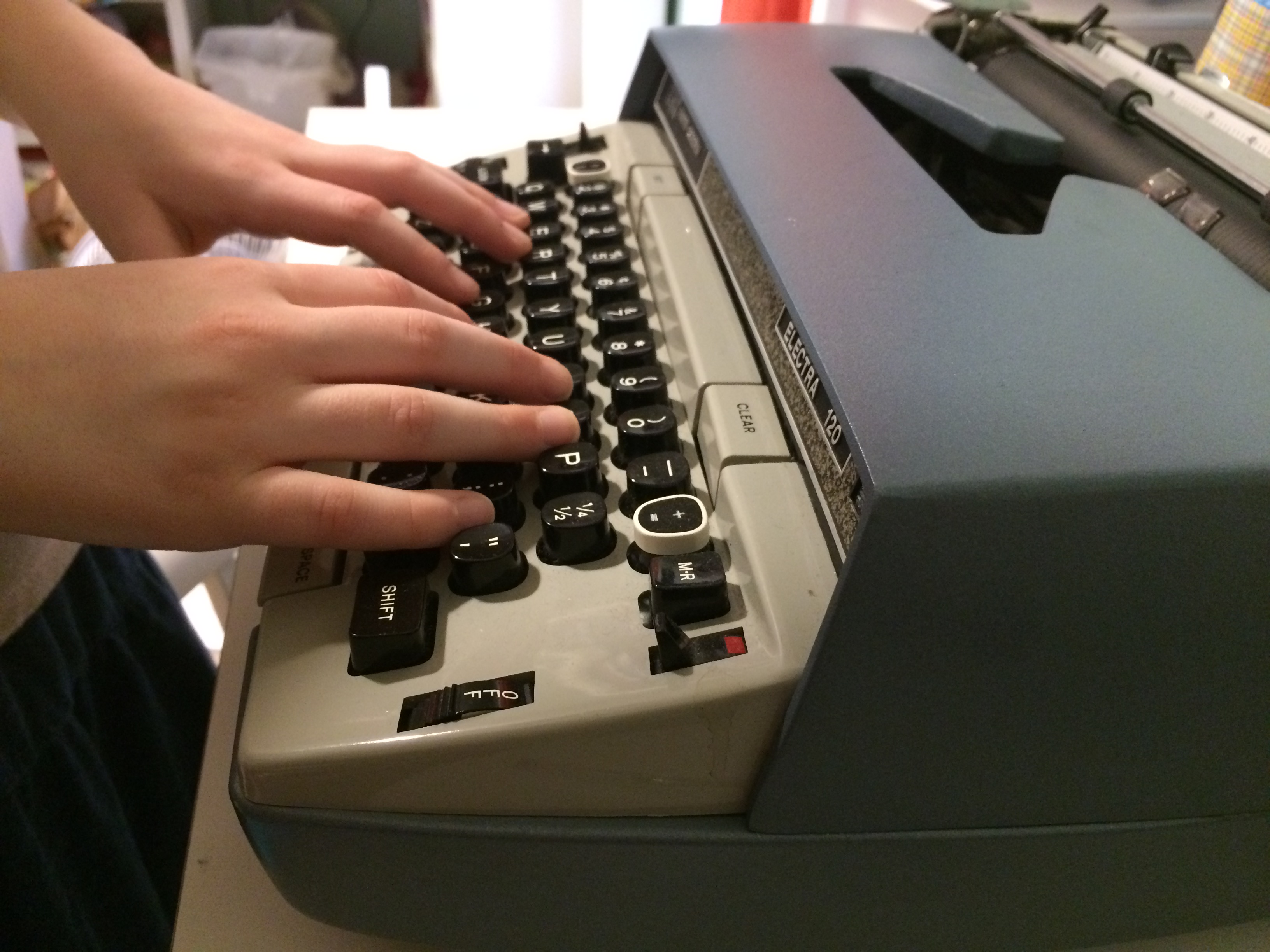 Typewriter with hands